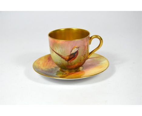 A Royal Worcester cup and saucer, decorated with Chinese pheasants. Signed by Sedgley. Date code 1926.