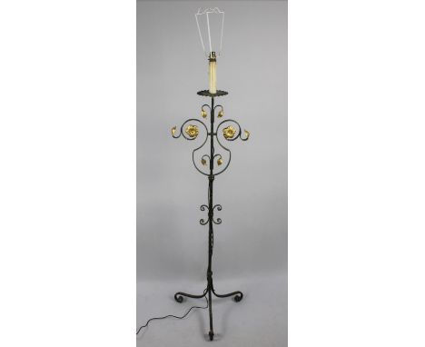 A Wrought Iron Standard Lamp with Tripod Support 
