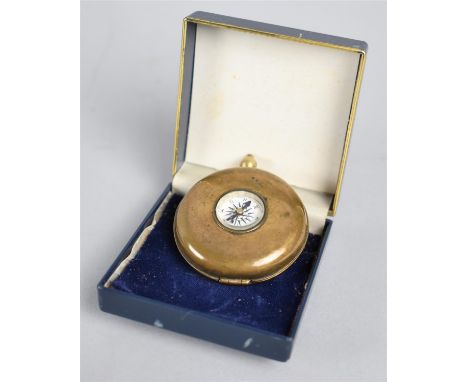 An Early 20th Century Novelty Collapsible Stirrup Cup in Case with Compass, the Case Back with Patent Mark, 4.5cm diameter 