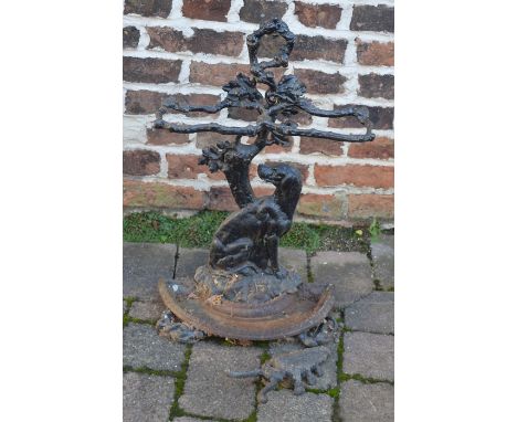 Cast iron stick stand and a boot jack