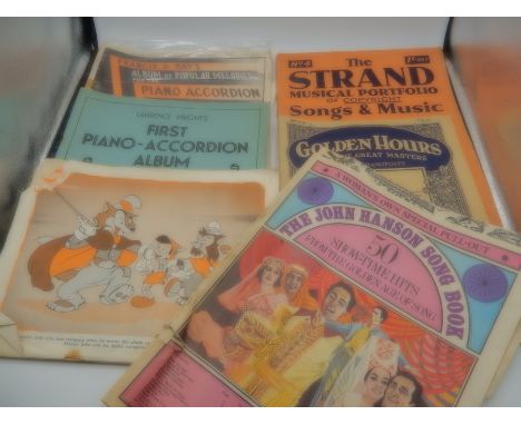 case full of vintage music sheets