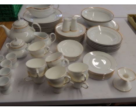 Part dinner service: 8 plates, 8 side plates, 8 bowls, 8 egg cups, 6 cake plates, 8 saucers, 8 cups, gravy boat, 2 serving bo