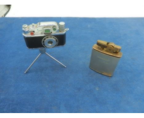 2 novelty lighters-camera and tripod and musical lighter