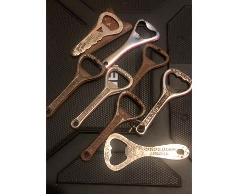 8 vintage bottle openers including Bass and Horseshoe Brewery 