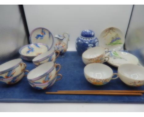 Oriental style china to include cups and saucers and ginger jar