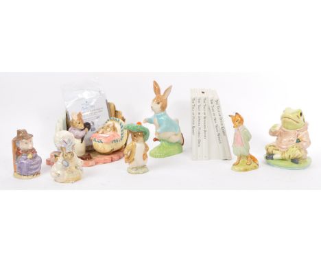 A collection of eight Beatrix Potter china figurines with makers mark to base to include Royal Albert, Beswick and Border Fin