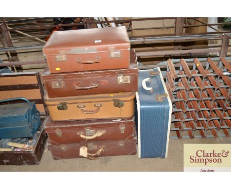 Six vintage suitcases