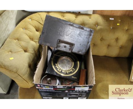 A box containing various sundry items to include cribbage board, ammo box, biscuit barrel; marbles; vintage magazines