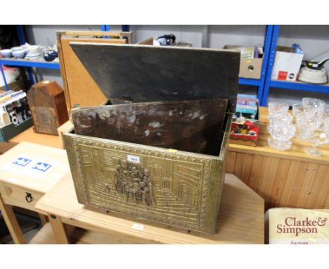A brass embossed coal box decorated with interior scene; and a brass embossed fire screen AF