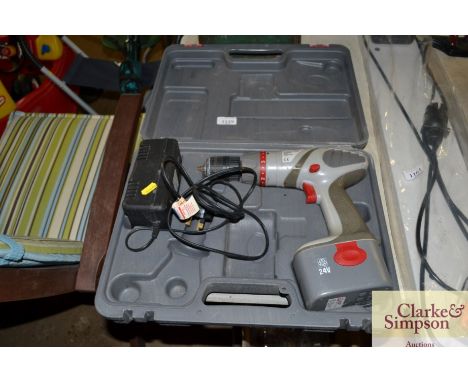 A Performance cordless drill with battery and charger in fitted case