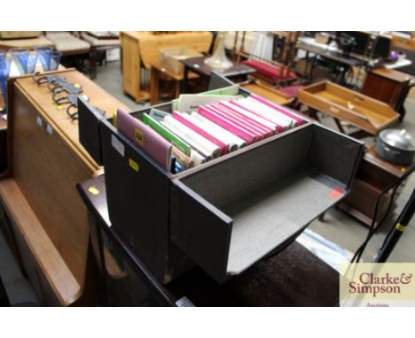 A box containing various Ordnance Survey maps 
