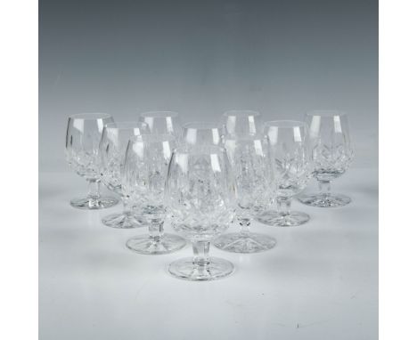 Collection of small cognac glasses, featuring a tapered round bowl with a short stem, cut with a straight and diagonal cut pa
