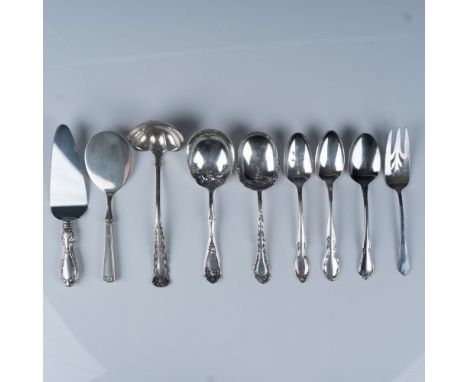 This collection includes two sterling silver pieces: a flat round server marked Sterling on the handle, weighing 80g, and a p