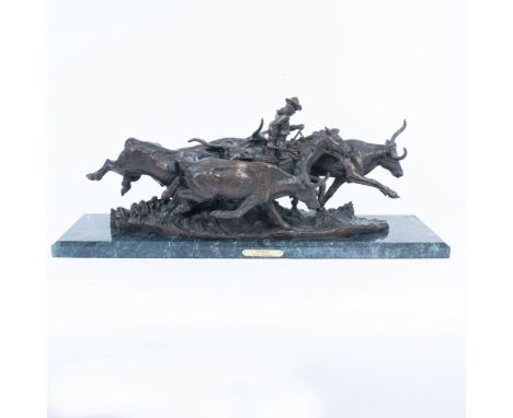 Western patinated bronze sculpture after the original by Frederic Remington (American, 1861-1909), on a green marble base. In