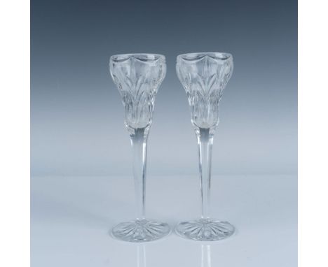 Part of the Marquis collection. A beautiful clear crystal set of 2 candlestick holders decorated in a foliate-motif cuts and 