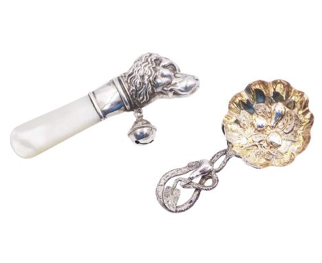 Unusual Victorian silver caddy spoon, the circular gilt bowl embossed with leaf and fruits, leading to a tendril handle also 