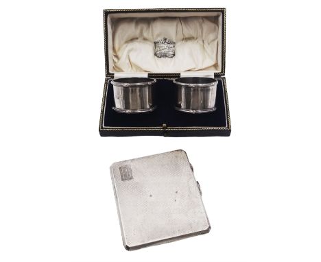 Early 20th century silver cigarette case, of rectangular form with canted corners, engine turned decoration and engraved init