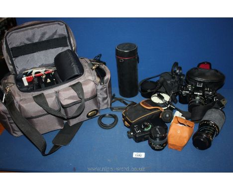 A quantity of Camera equipment including Minolta X.700, Euro Master light meter, Minolta Auto 132 Px flash unit etc, all in a