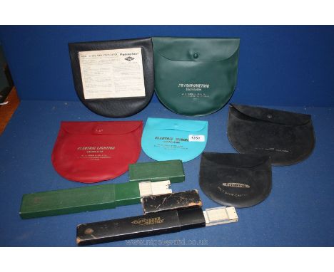 Six Calculating wheels including Volt Drop, Psychometric, Electric Lighting, Belt Conveyor etc and two cased slide rules.