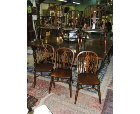 A bespoke set of six Ash and Elm Windsor country Chairs (by IJL Brown) having stick and pierced splat backs, solid Elm seats,