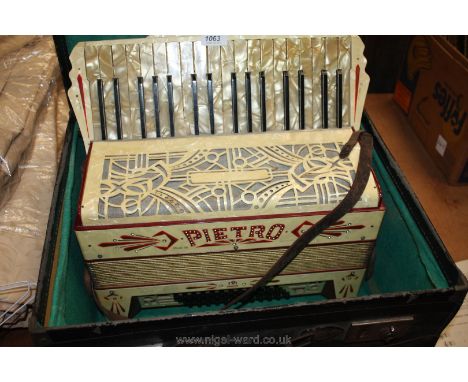 A cased Piano Accordion