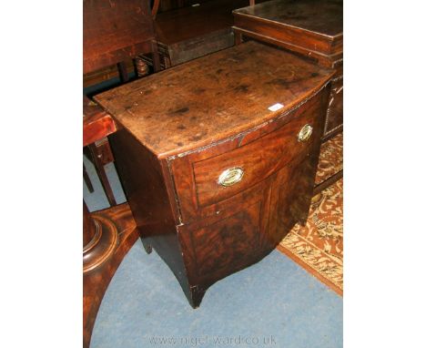 A Georgian Mahogany converted Chest Commode, bow fronted with single upper drawer with brass handles, on lower shaped apron a