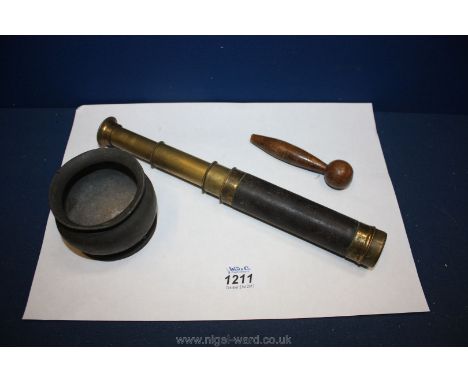 A pocket sized leather bound Brass Telescope and a small antique Pewter Bowl.