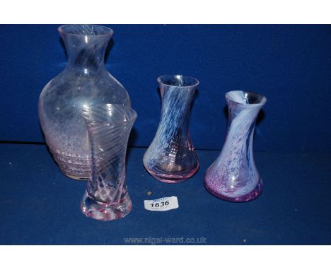 Four pink Caithness glass vases.