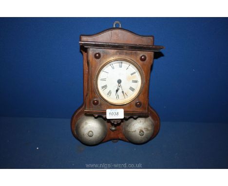 A wooden wall hanging Alarm Clock, circa 1900 (The ''Thunder'' Alarm), having two alarm bells, hinged backboard to access mov