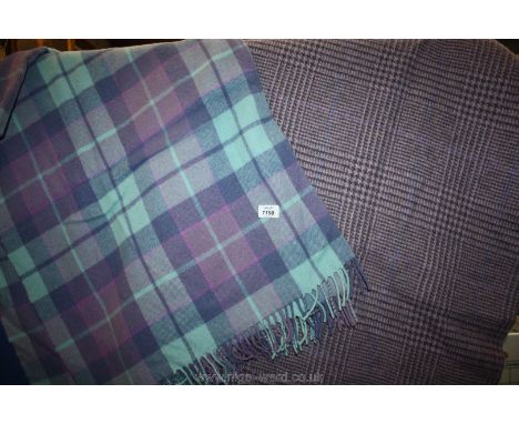 A Pringle pure new wool Cape in lilac and jade and a Cotswold Woollen Weavers Cape in lilac and grey check.