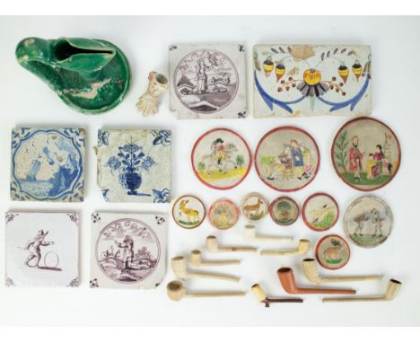 Lot with various earthenware items A Spanish tile, 18thC Delft tiles (5), 9 Pataccons, 9 pipe clay pipes and a South European