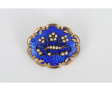 Antique 14K Gold Blue Enamel Pin. Blue enamel with inlaid pearl along with small cut accent diamonds. Size: 4.6 x 4 cm.