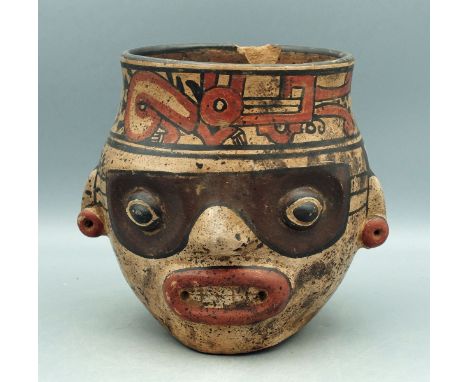 A large Nicoya portrait head from Costa Rica,  ca. 500 - 1000 AD.  This Galo Polychrome  type vessel is 6-1/2 in. high, 6-1/2