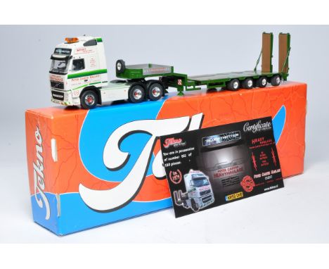 Tekno 1/50 diecast model truck issue comprising Volvo Low Loader Trailer in the livery of Peter Carter. Looks to be without o
