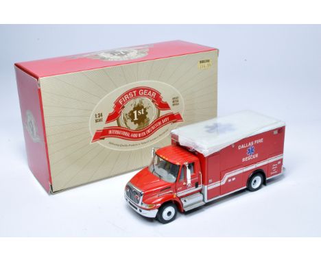 First Gear 1/34 Diecast model truck issue comprising International 4400 Rescue (Dallas). Excellent in box. 