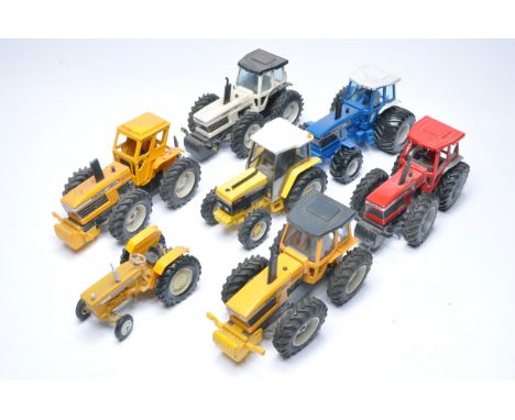An assortment of mostly County themed tractor issues from mainly Britains plus other conversions. Display wear to all, would 