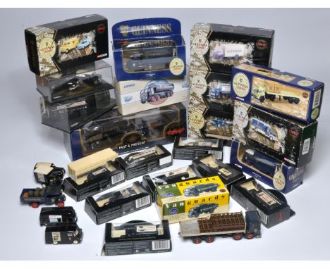 A large collection of diecast model vehicles in the livery of Guinness. Mostly Corgi 1/50 as shown. Displayed. 