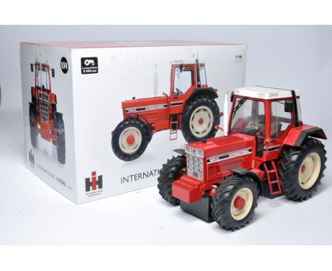 Universal Hobbies 1/16 diecast farm model issue comprising International 1455XL Tractor. Generally good, has been displayed a
