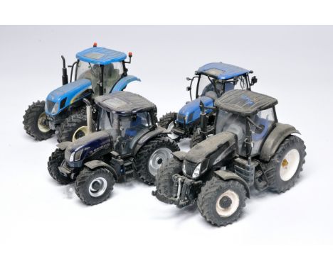 Assorted Universal Hobbies and ROS limited edition New Holland tractor issues. All would benefit from a clean, as shown. 