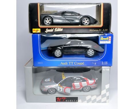 Trio of 1/18 diecast model cars from Maisto, Audi TT and UT Models. Look to be without obvious sign of notable fault. In orig