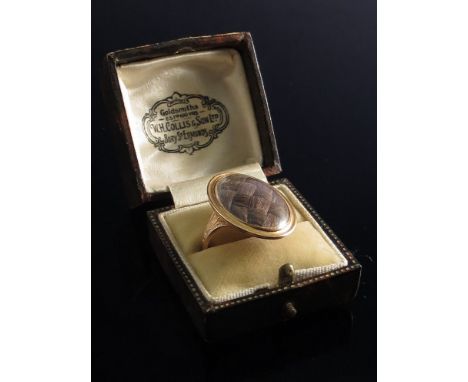 A George III hairwork mourning ring, inscribed John Monro 24 June 1779