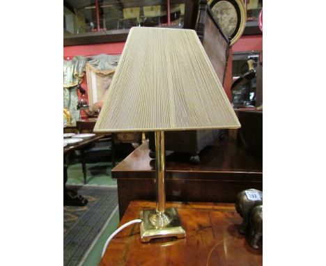 A brass table lamp with stranded roped shade, 46cm tall