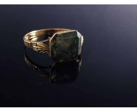 A 19th Century moss agate ring, closed back setting