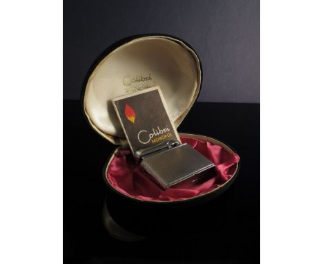 A cased Colibri silver lighter 