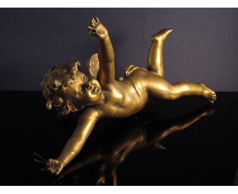 A gilded metal winged cherub from an Edwardian light fitting circa 1910