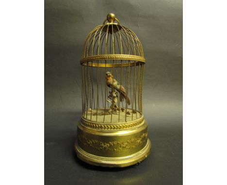 A late 19th / early 20th Century French made "Bird-in-a-cage" automaton musical box, 28cm tall