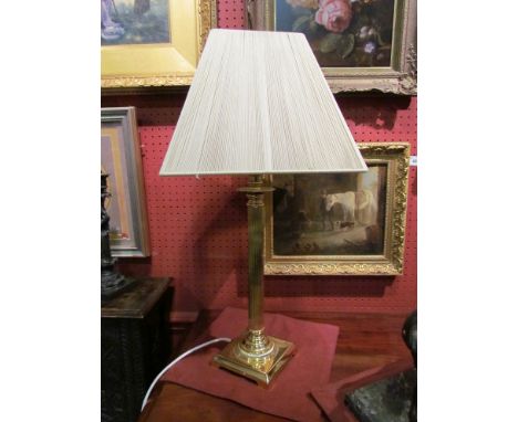 A brass table lamp with fluted column on square base with stranded rope shade, 61cm tall