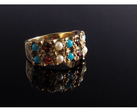 A 9ct gold double row ring set with garnets, turquoise and pearls   