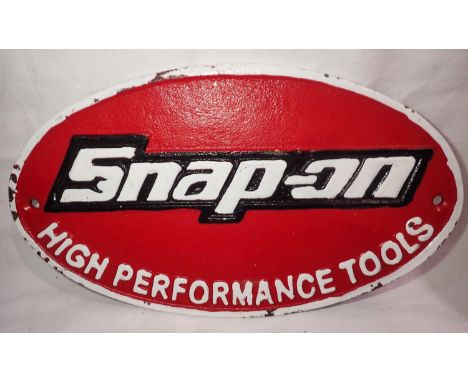 Cast iron Snap on Tools plaque, W: 25 cm. P&amp;P Group 2 (£18+VAT for the first lot and £3+VAT for subsequent lots) 