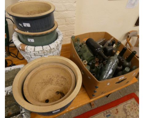 A pair of glazed ceramic planters, together with a pair of troughs and a similar planter, together with a box of old bottles 